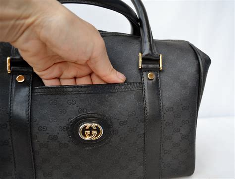 black gucci doctor bag.